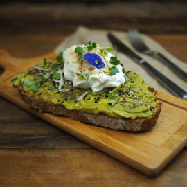 Toast with guacamole and poached egg